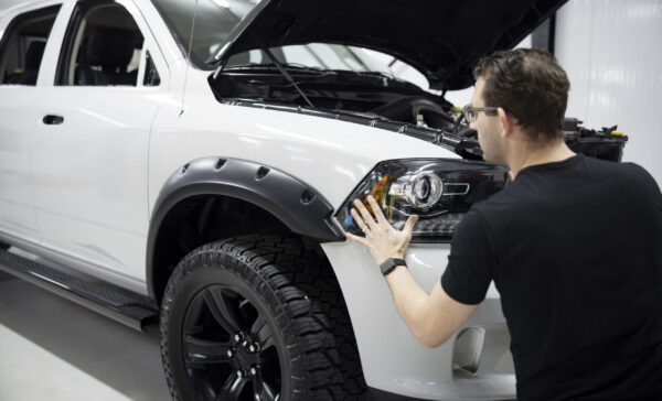 medium-shot-man-working-car